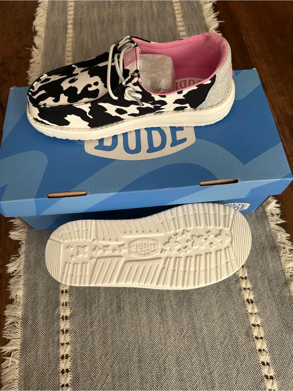 Kids' Cow Print Slip-On Shoe in Black & White with Pink Lining